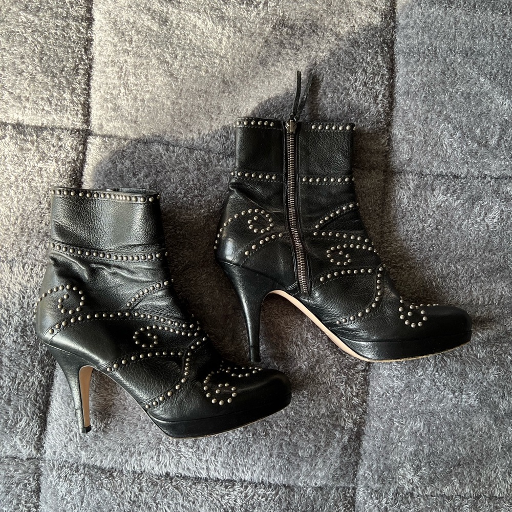 Miu Miu black platform heeled booties with silver stud designs, size 37